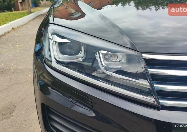 Чорний Фольксваген Туарег, об'ємом двигуна 2.97 л та пробігом 301 тис. км за 24800 $, фото 4 на Automoto.ua