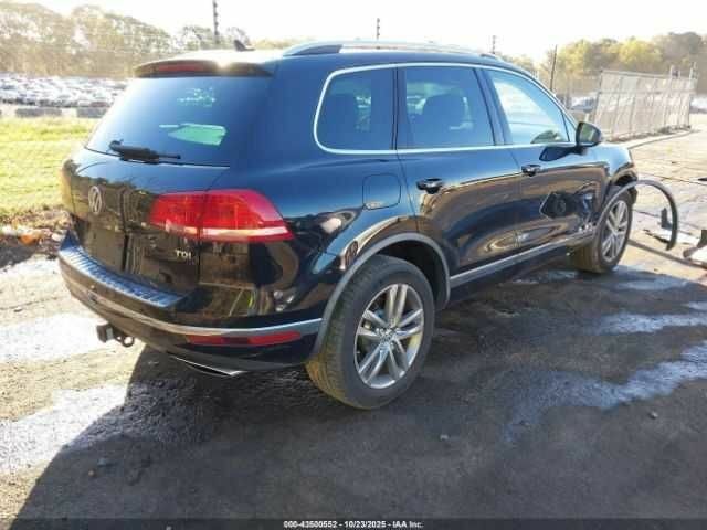 Черный Фольксваген Туарег, объемом двигателя 3 л и пробегом 170 тыс. км за 3000 $, фото 3 на Automoto.ua