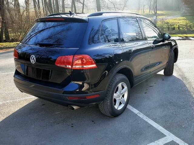 Черный Фольксваген Туарег, объемом двигателя 3 л и пробегом 76 тыс. км за 9300 $, фото 4 на Automoto.ua