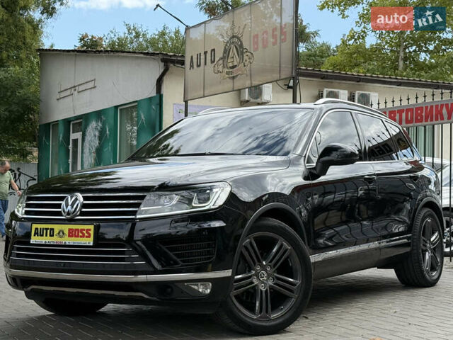 Черный Фольксваген Туарег, объемом двигателя 3 л и пробегом 212 тыс. км за 28999 $, фото 1 на Automoto.ua