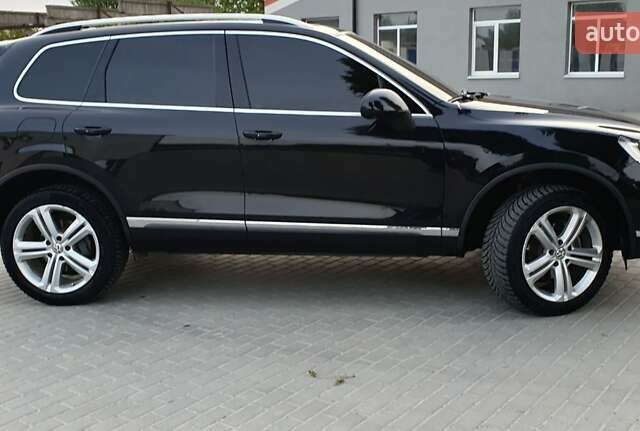 Черный Фольксваген Туарег, объемом двигателя 3 л и пробегом 230 тыс. км за 34500 $, фото 5 на Automoto.ua