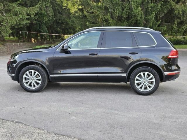 Черный Фольксваген Туарег, объемом двигателя 3 л и пробегом 253 тыс. км за 25000 $, фото 1 на Automoto.ua