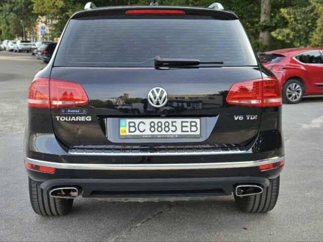 Черный Фольксваген Туарег, объемом двигателя 3 л и пробегом 253 тыс. км за 25000 $, фото 2 на Automoto.ua
