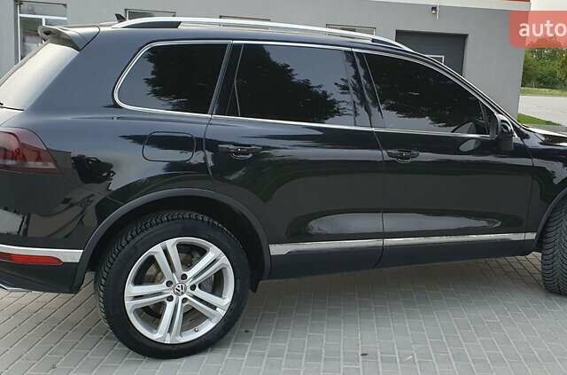 Черный Фольксваген Туарег, объемом двигателя 3 л и пробегом 230 тыс. км за 34500 $, фото 4 на Automoto.ua