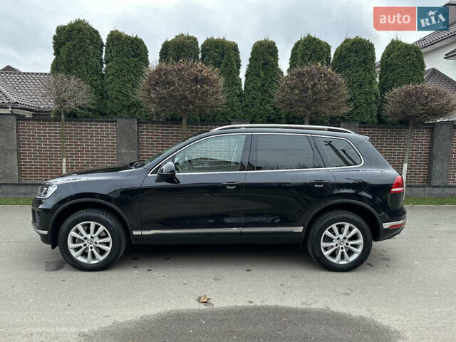 Чорний Фольксваген Туарег, об'ємом двигуна 3 л та пробігом 218 тис. км за 26800 $, фото 2 на Automoto.ua