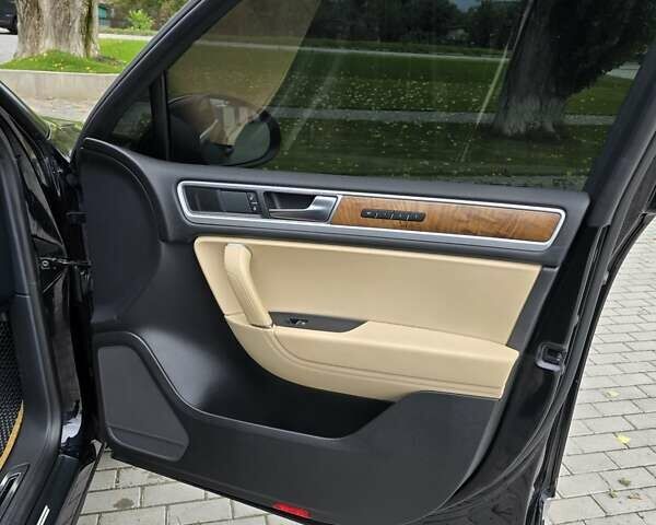 Черный Фольксваген Туарег, объемом двигателя 3 л и пробегом 230 тыс. км за 34500 $, фото 22 на Automoto.ua