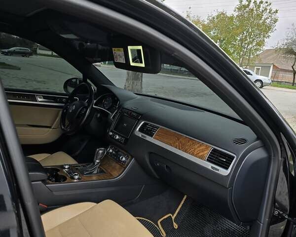 Черный Фольксваген Туарег, объемом двигателя 3 л и пробегом 230 тыс. км за 34500 $, фото 23 на Automoto.ua