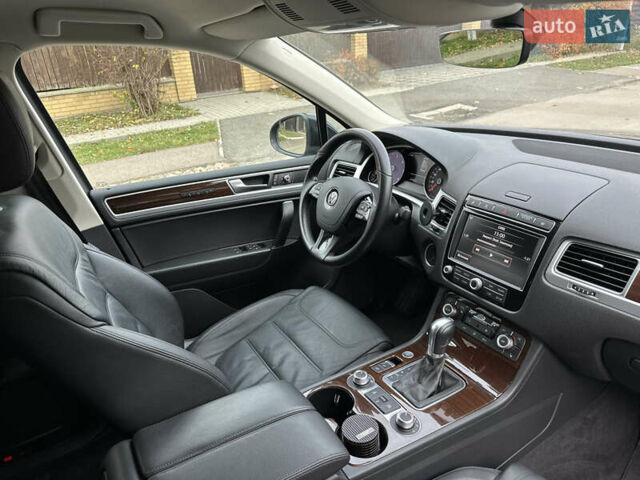 Чорний Фольксваген Туарег, об'ємом двигуна 3 л та пробігом 218 тис. км за 26800 $, фото 12 на Automoto.ua