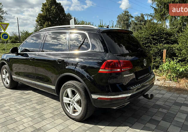 Черный Фольксваген Туарег, объемом двигателя 3 л и пробегом 210 тыс. км за 25000 $, фото 5 на Automoto.ua