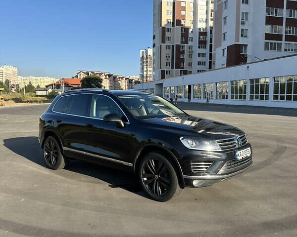 Чорний Фольксваген Туарег, об'ємом двигуна 3 л та пробігом 248 тис. км за 27500 $, фото 4 на Automoto.ua