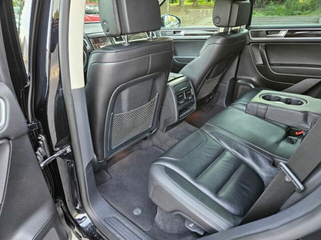 Черный Фольксваген Туарег, объемом двигателя 3 л и пробегом 253 тыс. км за 25000 $, фото 6 на Automoto.ua