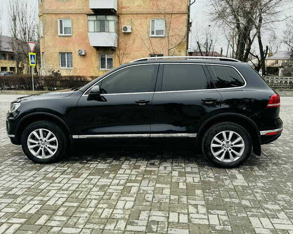 Черный Фольксваген Туарег, объемом двигателя 3 л и пробегом 253 тыс. км за 29999 $, фото 3 на Automoto.ua