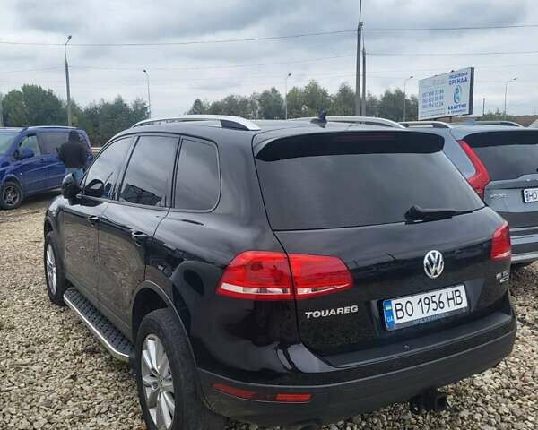 Чорний Фольксваген Туарег, об'ємом двигуна 3 л та пробігом 271 тис. км за 23900 $, фото 2 на Automoto.ua
