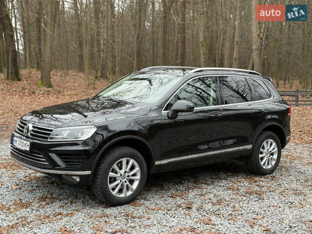 Чорний Фольксваген Туарег, об'ємом двигуна 3 л та пробігом 123 тис. км за 34900 $, фото 4 на Automoto.ua