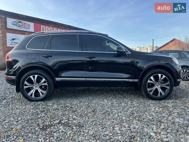 Чорний Фольксваген Туарег, об'ємом двигуна 3 л та пробігом 233 тис. км за 23900 $, фото 17 на Automoto.ua