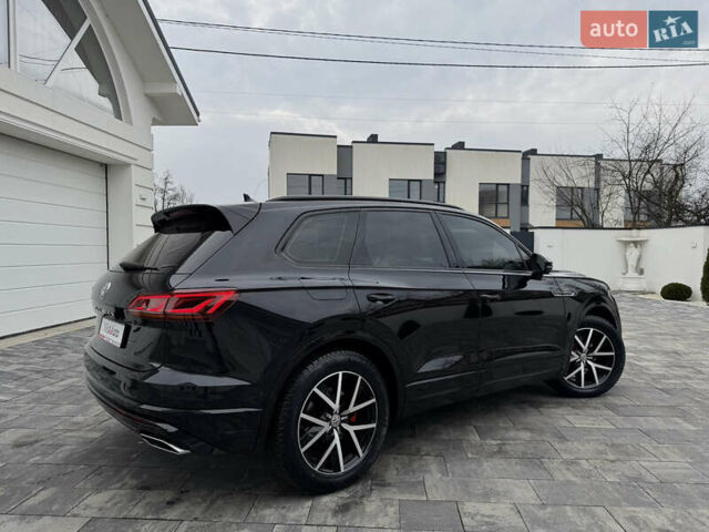 Чорний Фольксваген Туарег, об'ємом двигуна 3 л та пробігом 99 тис. км за 57888 $, фото 12 на Automoto.ua