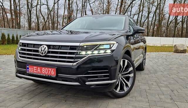 Черный Фольксваген Туарег, объемом двигателя 3 л и пробегом 189 тыс. км за 42800 $, фото 1 на Automoto.ua