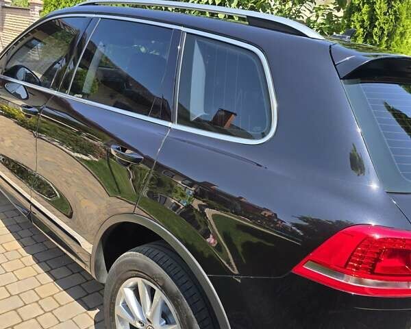 Черный Фольксваген Туарег, объемом двигателя 2.97 л и пробегом 129 тыс. км за 32000 $, фото 30 на Automoto.ua