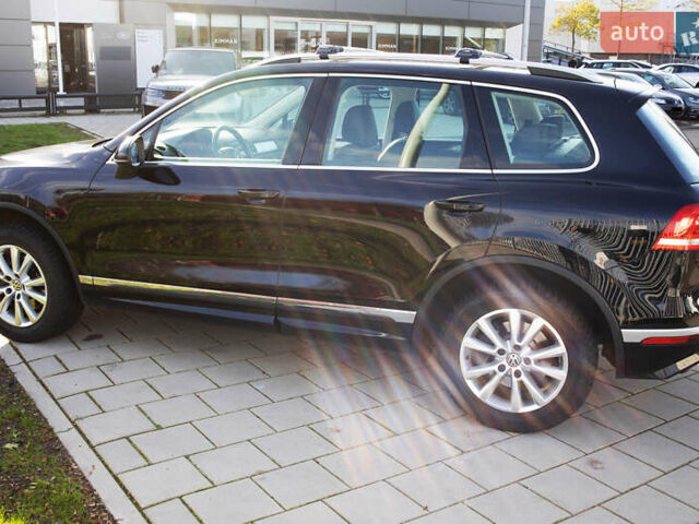 Чорний Фольксваген Туарег, об'ємом двигуна 3 л та пробігом 106 тис. км за 32519 $, фото 3 на Automoto.ua