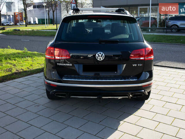 Чорний Фольксваген Туарег, об'ємом двигуна 3 л та пробігом 106 тис. км за 32519 $, фото 5 на Automoto.ua