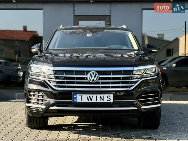 Чорний Фольксваген Туарег, об'ємом двигуна 3 л та пробігом 166 тис. км за 49900 $, фото 1 на Automoto.ua