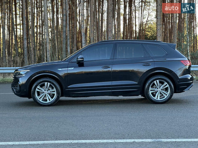 Черный Фольксваген Туарег, объемом двигателя 3 л и пробегом 259 тыс. км за 38999 $, фото 2 на Automoto.ua