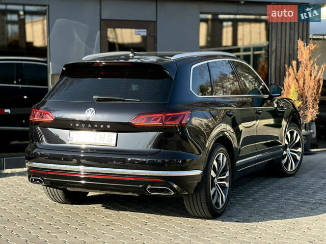 Чорний Фольксваген Туарег, об'ємом двигуна 3 л та пробігом 166 тис. км за 49900 $, фото 3 на Automoto.ua