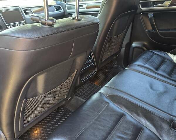 Черный Фольксваген Туарег, объемом двигателя 2.97 л и пробегом 129 тыс. км за 32000 $, фото 18 на Automoto.ua