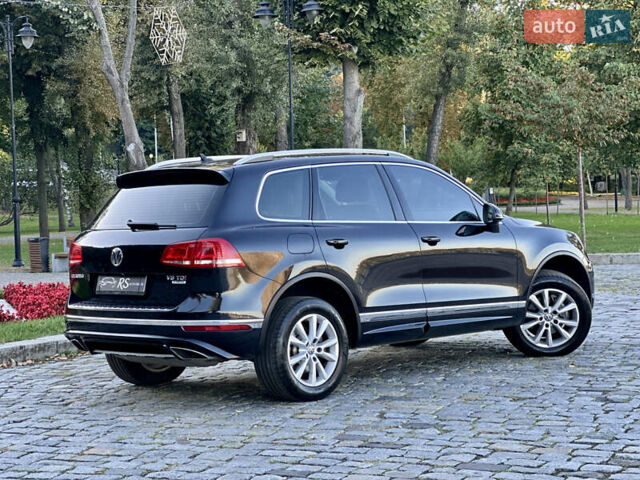 Черный Фольксваген Туарег, объемом двигателя 2.97 л и пробегом 275 тыс. км за 24800 $, фото 1 на Automoto.ua