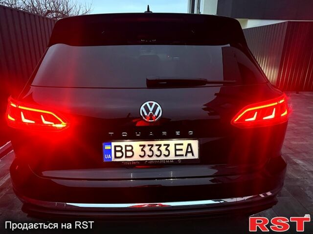 Черный Фольксваген Туарег, объемом двигателя 3 л и пробегом 226 тыс. км за 38500 $, фото 1 на Automoto.ua