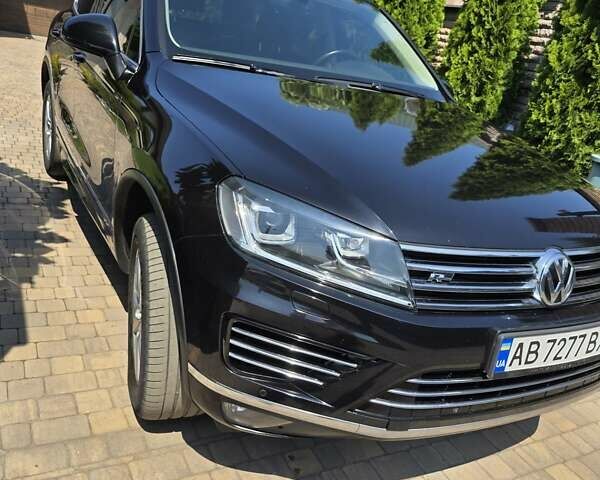 Черный Фольксваген Туарег, объемом двигателя 2.97 л и пробегом 129 тыс. км за 32000 $, фото 1 на Automoto.ua