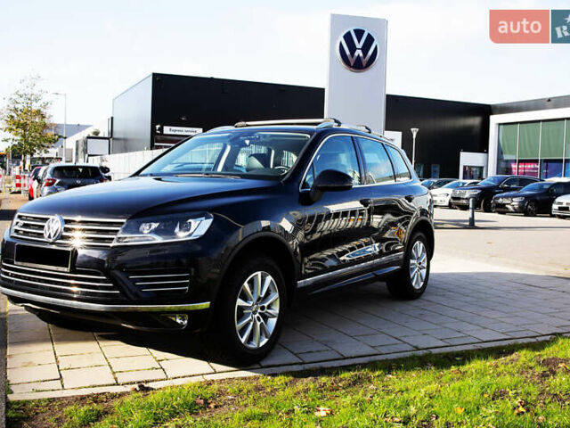Чорний Фольксваген Туарег, об'ємом двигуна 3 л та пробігом 106 тис. км за 32519 $, фото 1 на Automoto.ua