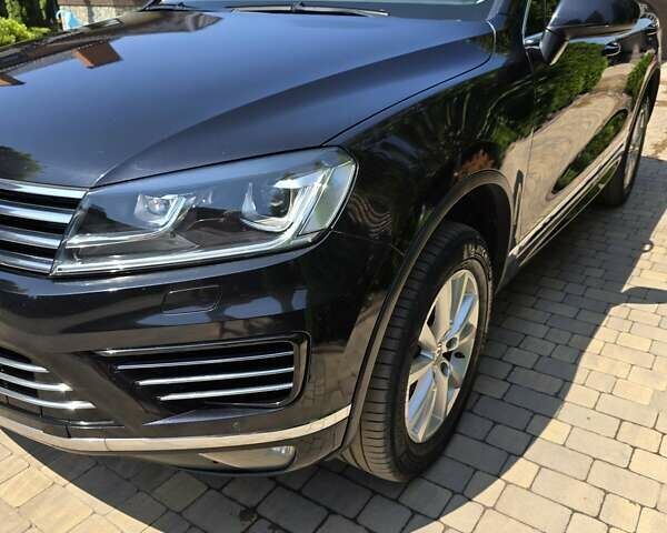 Черный Фольксваген Туарег, объемом двигателя 2.97 л и пробегом 129 тыс. км за 32000 $, фото 2 на Automoto.ua