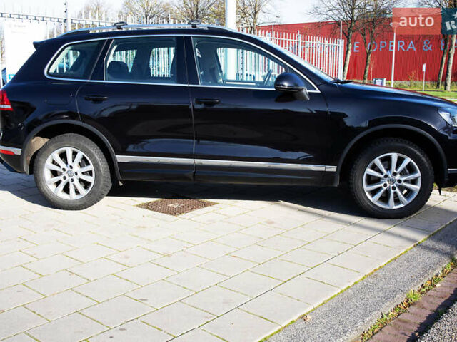 Чорний Фольксваген Туарег, об'ємом двигуна 3 л та пробігом 106 тис. км за 32519 $, фото 4 на Automoto.ua