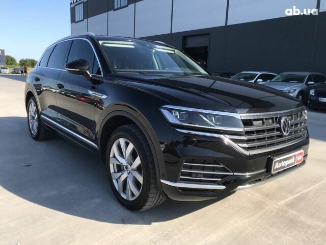 Чорний Фольксваген Туарег, об'ємом двигуна 3 л та пробігом 119 тис. км за 49990 $, фото 2 на Automoto.ua