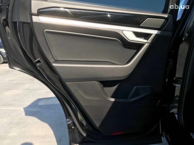 Чорний Фольксваген Туарег, об'ємом двигуна 3 л та пробігом 119 тис. км за 49990 $, фото 26 на Automoto.ua