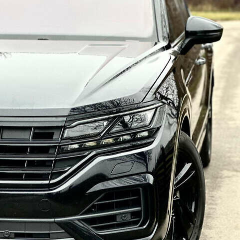 Черный Фольксваген Туарег, объемом двигателя 3 л и пробегом 115 тыс. км за 45500 $, фото 1 на Automoto.ua