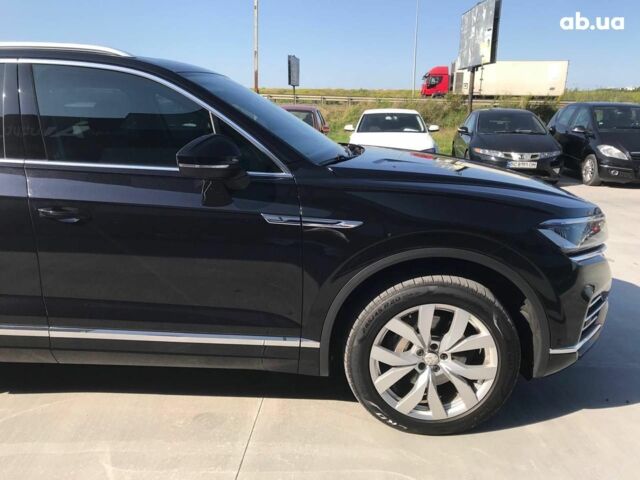 Чорний Фольксваген Туарег, об'ємом двигуна 3 л та пробігом 119 тис. км за 49990 $, фото 3 на Automoto.ua