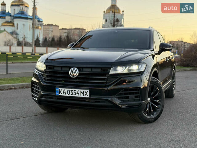 Черный Фольксваген Туарег, объемом двигателя 2.97 л и пробегом 165 тыс. км за 39900 $, фото 2 на Automoto.ua