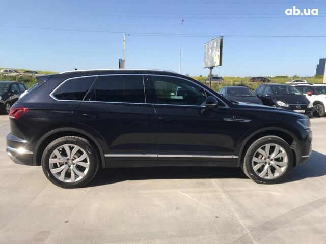 Чорний Фольксваген Туарег, об'ємом двигуна 3 л та пробігом 119 тис. км за 49990 $, фото 4 на Automoto.ua