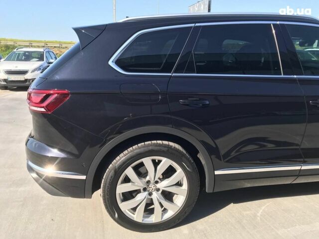 Чорний Фольксваген Туарег, об'ємом двигуна 3 л та пробігом 119 тис. км за 49990 $, фото 5 на Automoto.ua