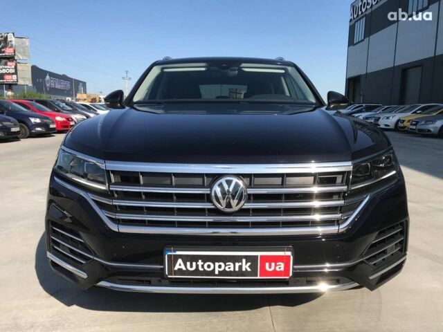 Чорний Фольксваген Туарег, об'ємом двигуна 3 л та пробігом 119 тис. км за 49990 $, фото 1 на Automoto.ua