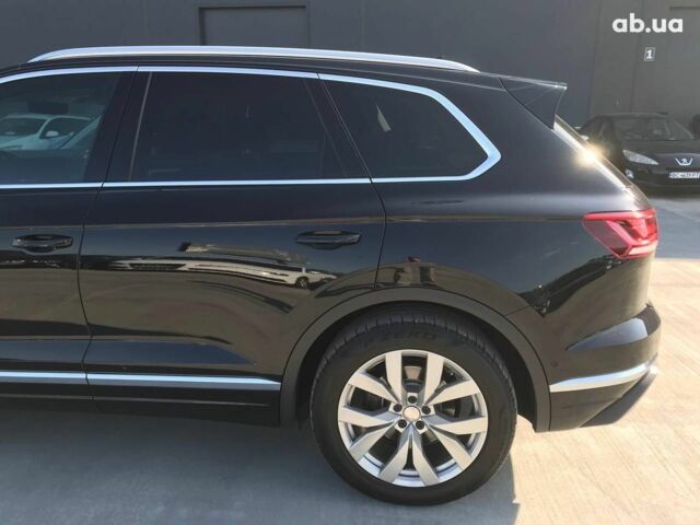 Чорний Фольксваген Туарег, об'ємом двигуна 3 л та пробігом 119 тис. км за 49990 $, фото 8 на Automoto.ua