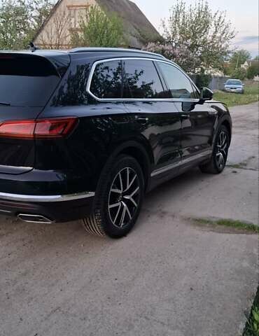 Фольксваген Туарег 2020 у Ахтырке на Automoto.ua Чорний Фольксваген Туарег, об'ємом двигуна 2.97 л та пробігом 150 тис. км за 52700 $, фото 1 на Automoto.ua