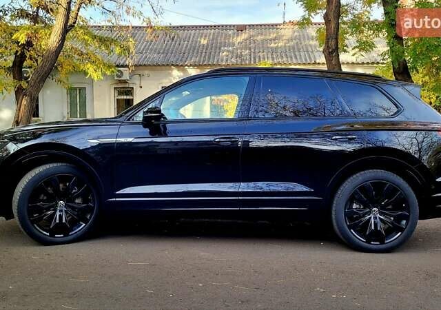 Чорний Фольксваген Туарег, об'ємом двигуна 3 л та пробігом 86 тис. км за 56900 $, фото 6 на Automoto.ua