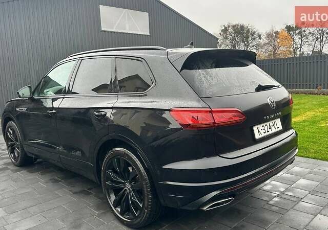Чорний Фольксваген Туарег, об'ємом двигуна 3 л та пробігом 145 тис. км за 49990 $, фото 2 на Automoto.ua