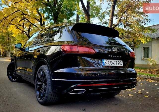 Чорний Фольксваген Туарег, об'ємом двигуна 3 л та пробігом 86 тис. км за 56900 $, фото 4 на Automoto.ua