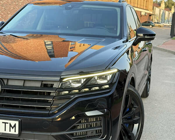 Черный Фольксваген Туарег, объемом двигателя 3.96 л и пробегом 115 тыс. км за 59900 $, фото 1 на Automoto.ua