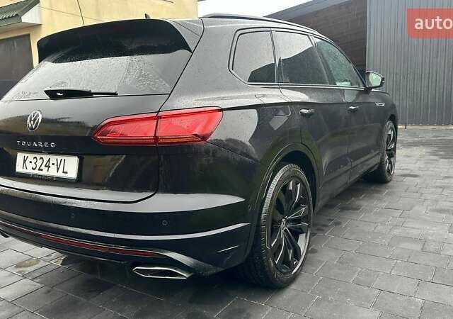 Чорний Фольксваген Туарег, об'ємом двигуна 3 л та пробігом 145 тис. км за 49990 $, фото 4 на Automoto.ua