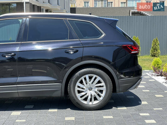 Черный Фольксваген Туарег, объемом двигателя 3 л и пробегом 143 тыс. км за 46000 $, фото 6 на Automoto.ua